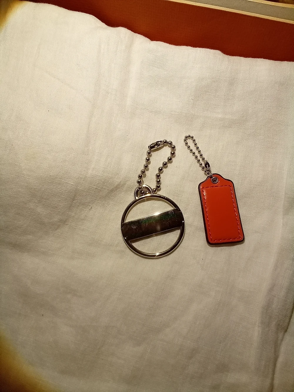 Coach Orange Leather & Silver-Tone Logo Keychain Set